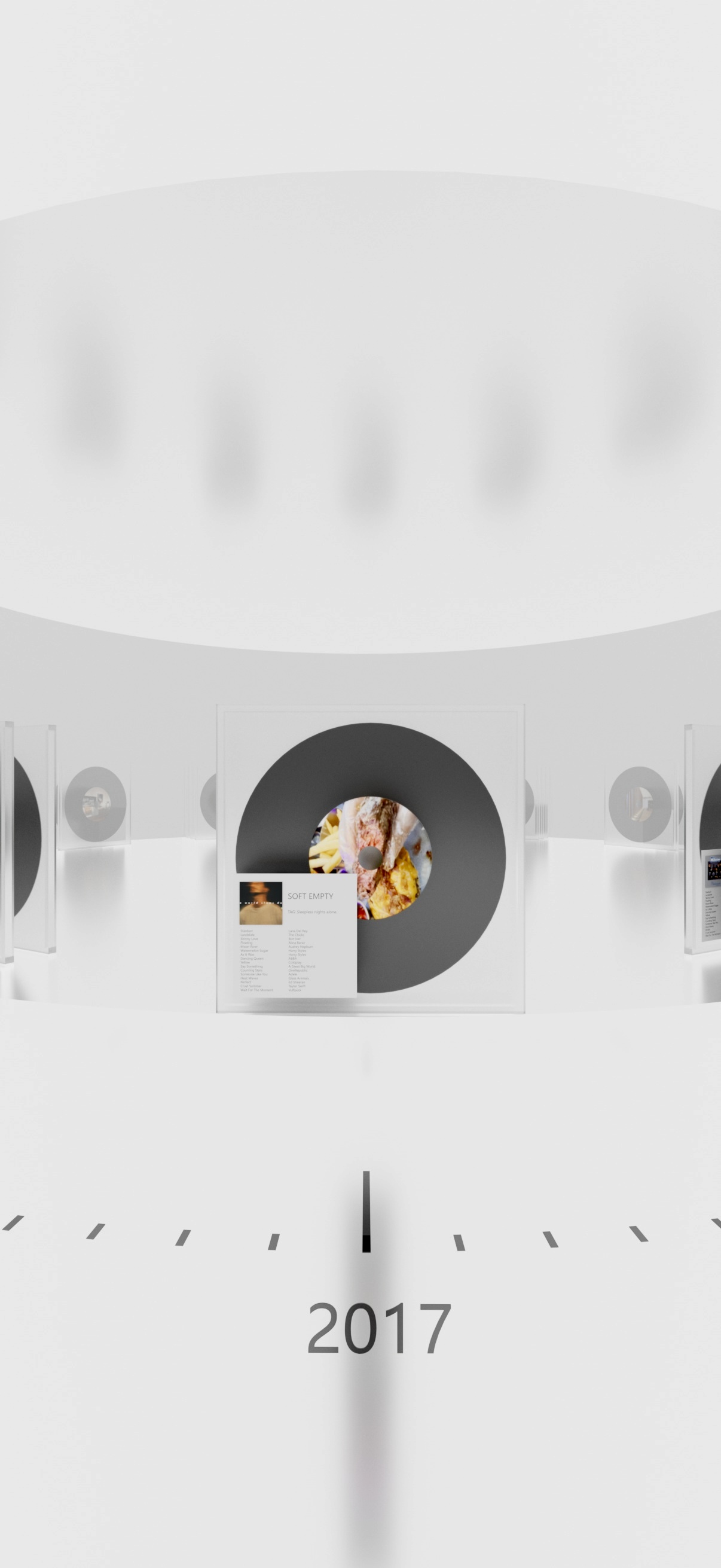 Circular time navigation focused on 2017 with a transparent album case